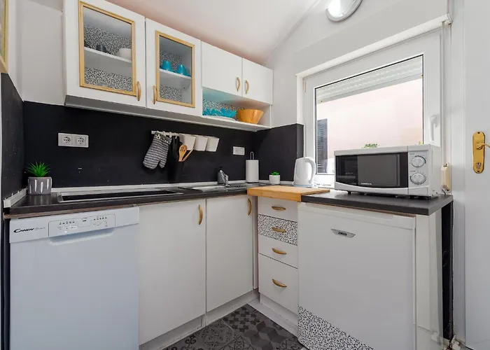 Four-bedroom In Hébergement de vacances *